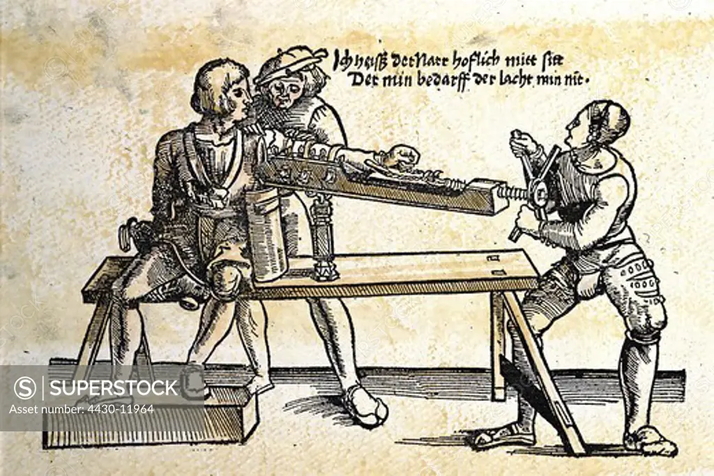 medicine treatment treatment of an arm with a rack woodcut from ""Feldtbuch der Wundartzney"" by Hans von Gersdorff Strasbourg Germany 1528,