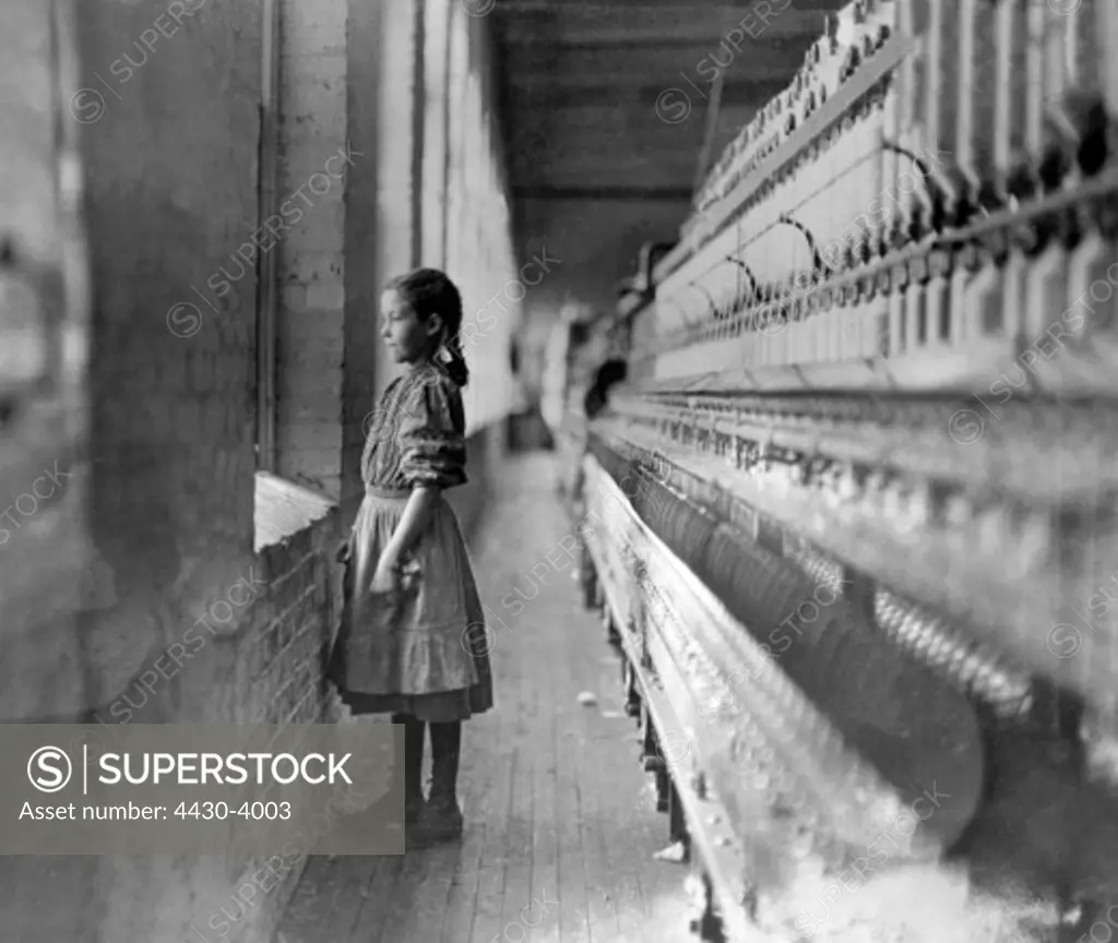 people children child labour 10 year old girl standing beside looms circa 1910,