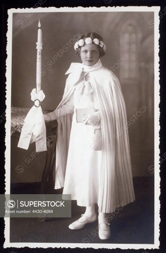 religion communion candidate young girl Germany 1930s 30s tradition dress candle,