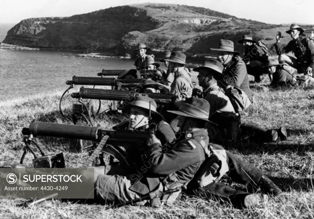 military Australia recruits during the basic military training circa 1940 firing practice with heavy Vickers machine guns,