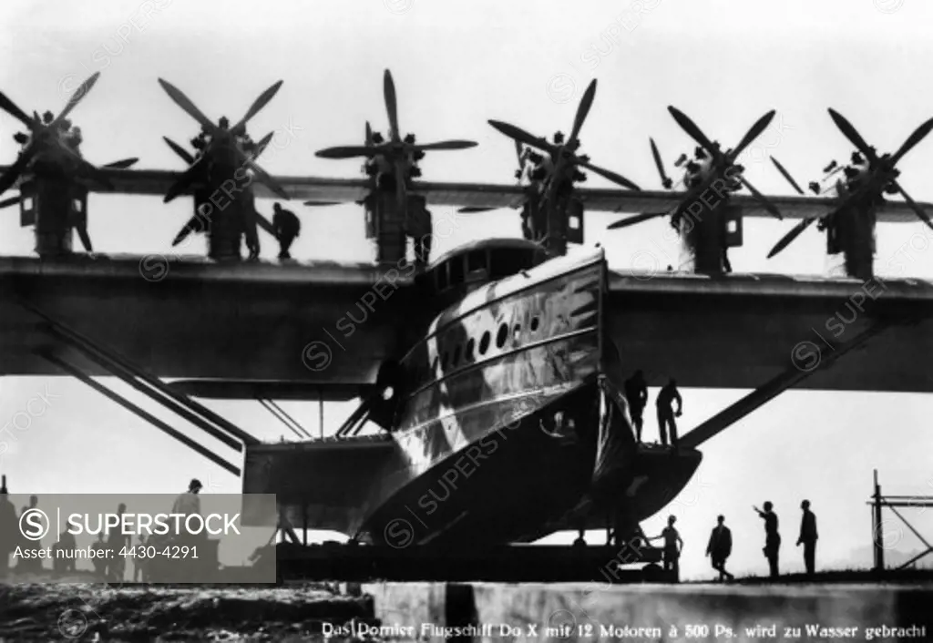 transport transportation aviation seaplane Dornier Do X with 12 engines is watered 1930s,