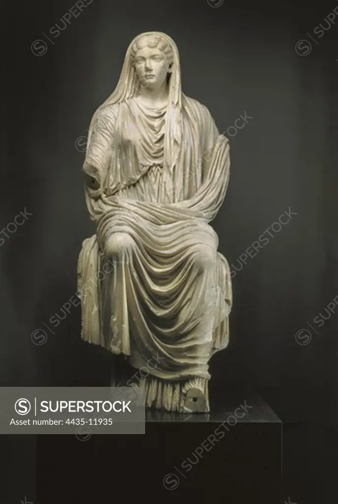 LIVIA DRUSILLA (58 BC - AD 29). Roman empress, third wife of Augustus. Sitting statue of Livia (1st c. AD). Roman art. Sculpture on marble. SPAIN. MADRID (AUTONOMOUS COMMUNITY). Madrid. National Museum of Archaeology.