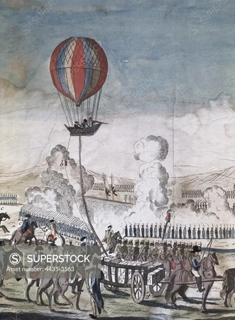 Hydrogen hot-air balloon for military use made by Charles Coutelle. Hot-air balloons were used by Napoleon's army to keep an eye on the enemy and lead the battle. The ballons were attached to the floor using wires and they communicate using  messages inside sand sacks which slided through the wires. Engraving.