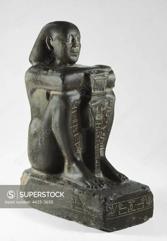 Harsomtus-em-hat figure. 664 BC. Saite period. Made in basalt. Egyptian art. Ptolemaic period. Sculpture on rock. SPAIN. MADRID (AUTONOMOUS COMMUNITY). Madrid. National Museum of Archaeology.