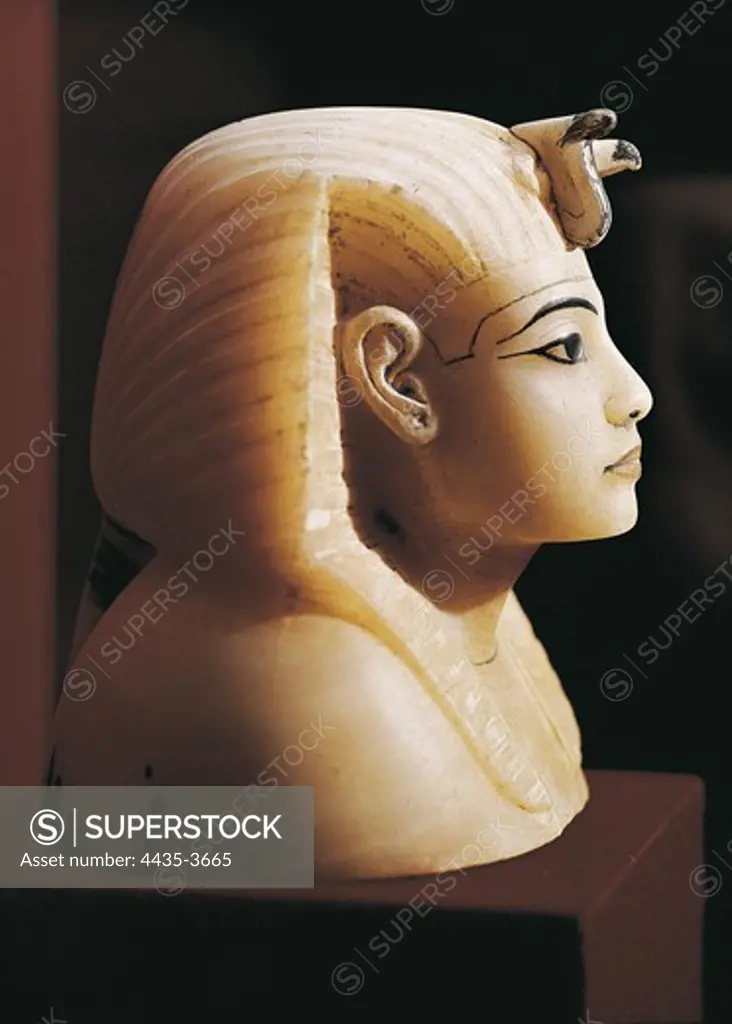 Canopic vase lid with Tutamkhamen's effigy. 1370 - 1352 BC. Egyptian art. New Kingdom. Sculpture in the round. EGYPT. CAIRO. Cairo. Egyptian Museum. Proc: EGYPT. QUENA. Dayr al-Bahri. Valley of the Kings. Tomb of Tutankhamun.