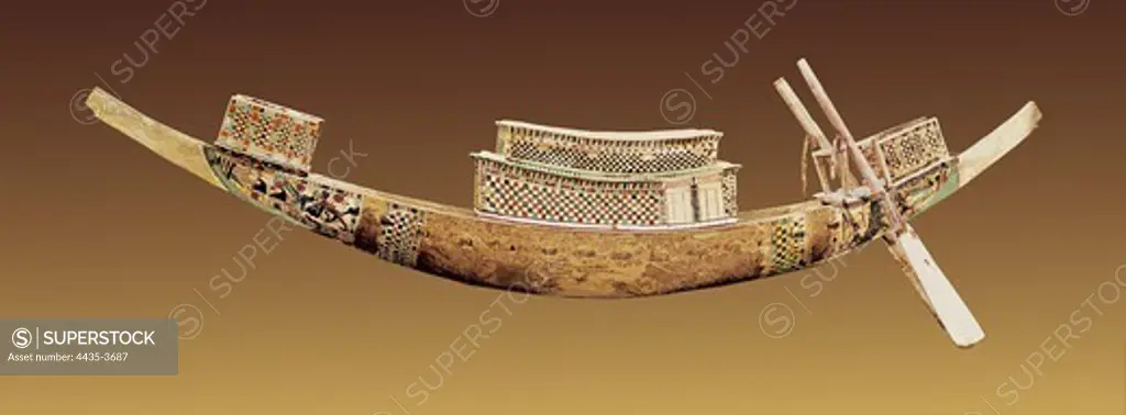 Royal boat. 1375 -1358 BC. Boat model that the Pharaohs probably used for theirs trips to the other side. Treasure of Tutankhamun. Egyptian art. New Kingdom. Sculpture on wood. EGYPT. CAIRO. Cairo. Egyptian Museum. Proc: EGYPT. QUENA. Dayr al-Bahri. Valley of the Kings. Tomb of Tutankhamun.