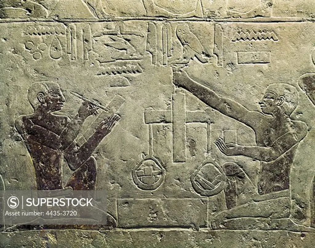 Relief model with shopkeeper. ca. 2465 -2323 BC. Egyptian art. Old Kingdom. Relief on rock. EGYPT. CAIRO. Cairo. Egyptian Museum. Proc: EGYPT. CAIRO. Saqqara. Mastaba of Kaemrehu.
