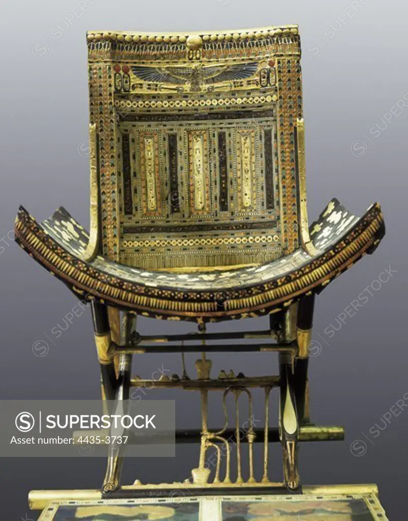 Ecclesiastical chair. 1333 BC. Inlaid ebony wood with ivory and glass. Egyptian art. New Kingdom. Furniture. EGYPT. CAIRO. Cairo. Egyptian Museum. Proc: EGYPT. QUENA. Dayr al-Bahri. Valley of the Kings. Tomb of Tutankhamun.