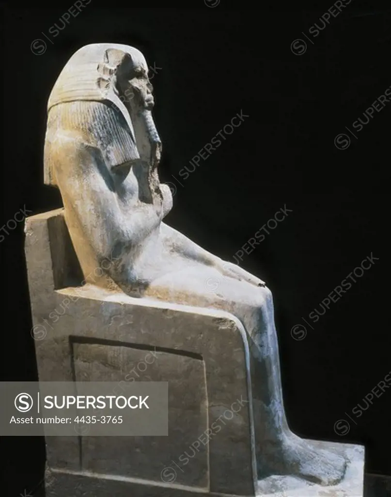 Seated statue of King Djoser. 2611 BC. Detail. Egyptian art. Old Kingdom. Sculpture on rock. EGYPT. CAIRO. Cairo. Egyptian Museum. Proc: EGYPT. CAIRO. Saqqara.