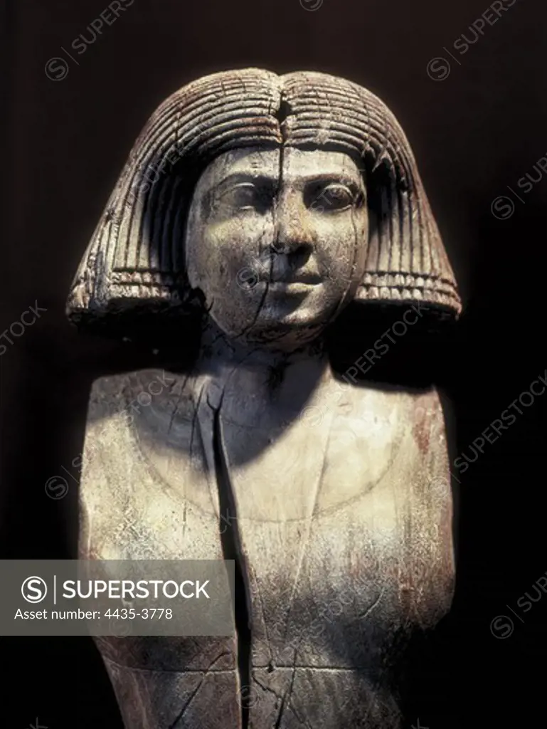 Ka-aper's wife. ca. 2465 BC. Egyptian art. Old Kingdom. Sculpture on wood. EGYPT. CAIRO. Cairo. Egyptian Museum. Proc: EGYPT. CAIRO. Saqqara.