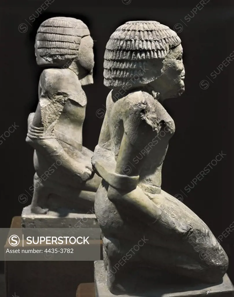 Two prisoners of war. 2323 - 2150 BC. Profile image. Egyptian art. Old Kingdom. Sculpture on rock. EGYPT. CAIRO. Cairo. Egyptian Museum. Proc: EGYPT. CAIRO. Saqqara.
