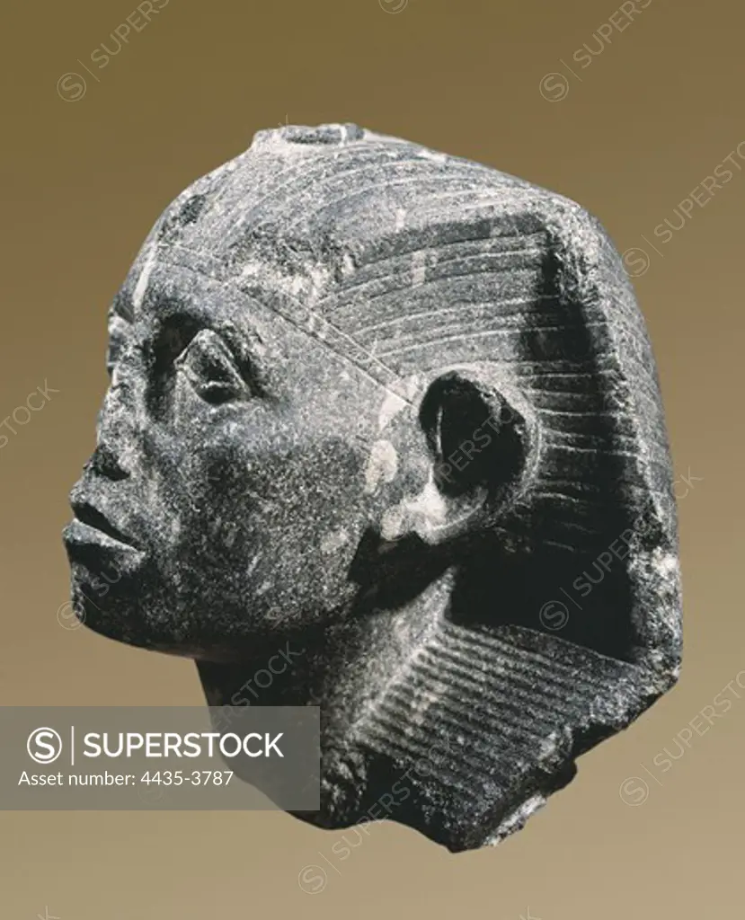 Head of Sesostris III. 1878 BC. Middle Kingdom. Egyptian art. Middle Kingdom. Sculpture on rock. EGYPT. CAIRO. Cairo. Egyptian Museum. Proc: EGYPT. Medamud. Temple at Medamud.
