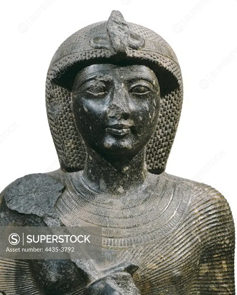 Bust of a sitted statue of Ramss II. 1290 -1237 BC. Grey granite. Egyptian art. New Kingdom. Sculpture on marble. EGYPT. CAIRO. Cairo. Egyptian Museum. Proc: EGYPT. San el-Hagar. Tanis.
