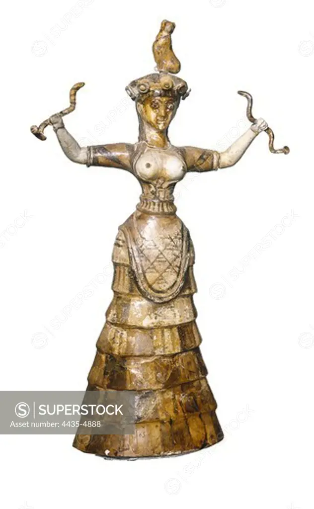 Snake Goddess or Household Goddess. ca. 1600 BC. Faence. Ceramics. GREECE. CRETE. IRAKLION. Iraklion. Archaeological Museum. Proc: GREECE. CRETE. IRAKLION. Knossos. Knossos Palace.