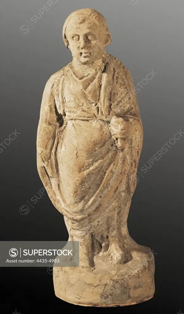 Philosopher. ITALY. Taranto. Taranto Archaelogical National Museum. Clay figure. Greek art. Sculpture.