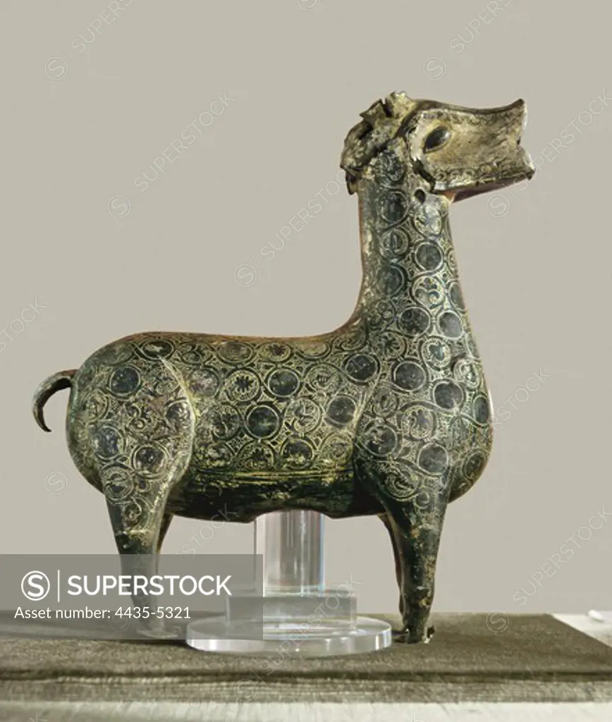 Deer of Cordoba. 2nd half 10th c. Hispano-Moresque art. Caliphate period. Sculpture on bronze. SPAIN. MADRID (AUTONOMOUS COMMUNITY). Madrid. National Museum of Archaeology. Proc: SPAIN. ANDALUSIA. Cordoba. Medina Azahara.