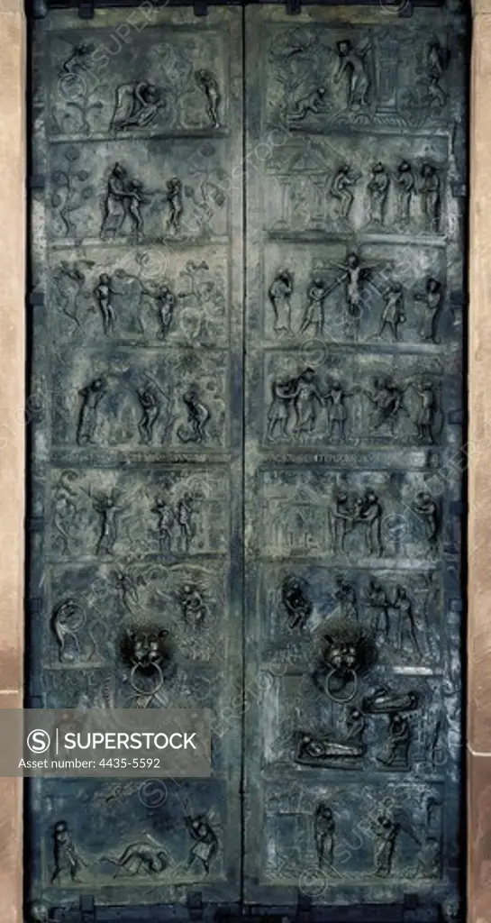 The Bernward Doors. 1015. GERMANY. Hildesheim. Cathedral of St. Mary. Decorated with the Biblical Scenes of Creation and Redemption. Ottonian art. Relief.