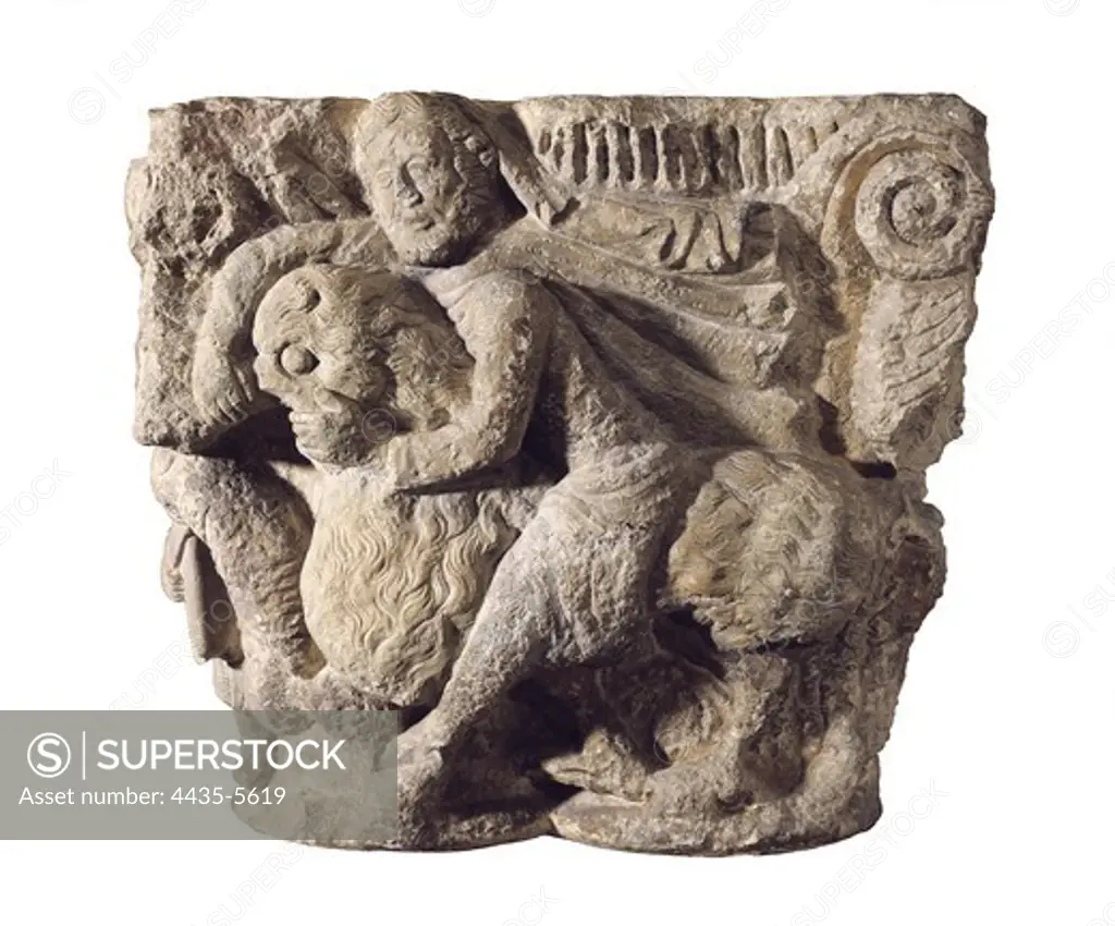 Samson's capital. 12th c. Samson breaking the jaws of a lion. Romanesque art. Relief on rock. SPAIN. CATALONIA. Barcelona. Frederic Mares Museum. Proc: SPAIN. CASTILE AND LEON. PALENCIA. Villaherreros.