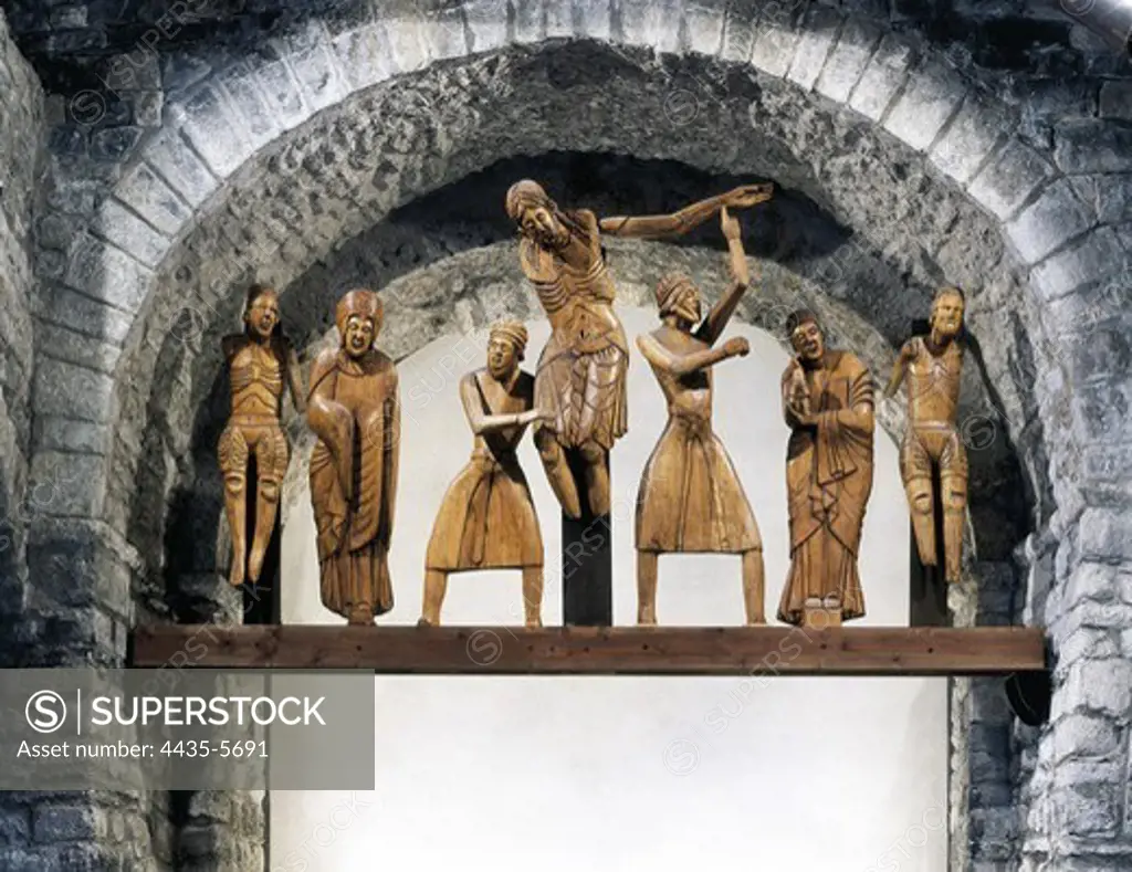 SPAIN. Vall de BoÕ. Erill la Vall. Church of Santa Eulölia. The Descent from the Cross. Catalan school. 12th c. Polychrome wood sculpture. Copy of the sculptural group made up of seven carvings, which now are   splitted between the National Museum of Art of Catalonia and the Vic Episcopal Museum. Romanesque art. Sculpture on wood.