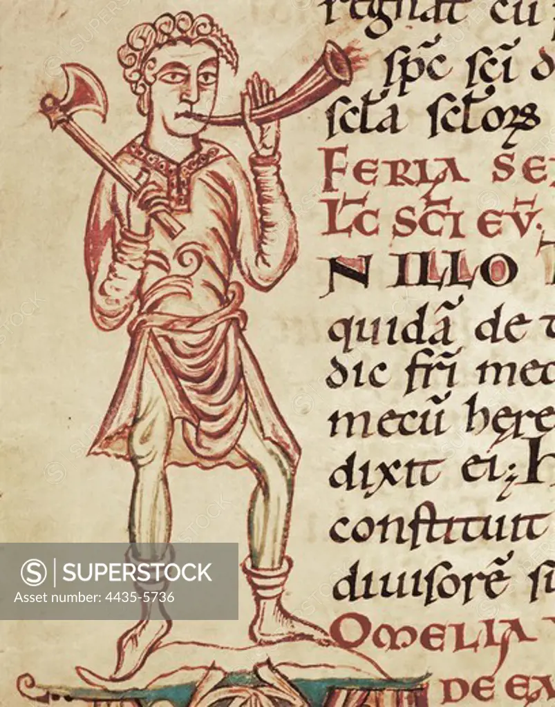 Lectionary of Cathedral of Reims: Character with an axe and a corn. French school, 11th century. Gothic art. FRANCE. CHAMPAGNE-ARDENNE. MARNE. Reims. Bibliothque Municipale (Municipal Library).