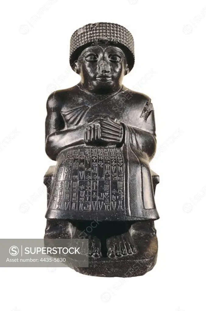 Gudea, Prince of Lagash. 2130 BC. Dedicated to Ningizzada, from ancient Girsu. Sumerian art. Sculpture on rock. FRANCE. ëLE-DE-FRANCE. Paris. Louvre Museum. Proc: IRAQ. Tello. Girsu.