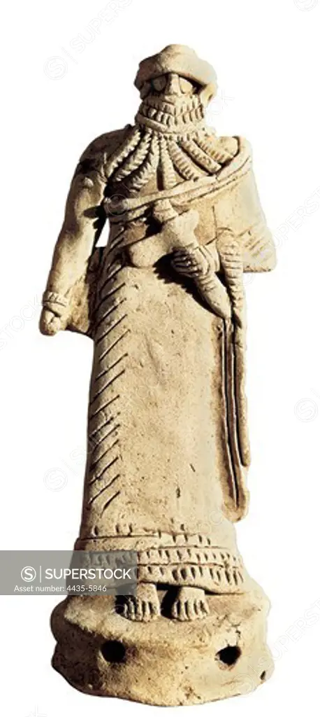 Figure of warrior. ca. 2000 BC. Assyrian art. Terra-cotta. IRAQ. Bagdad. Baghdad Museum. Proc: IRAQ. Tello. Girsu.