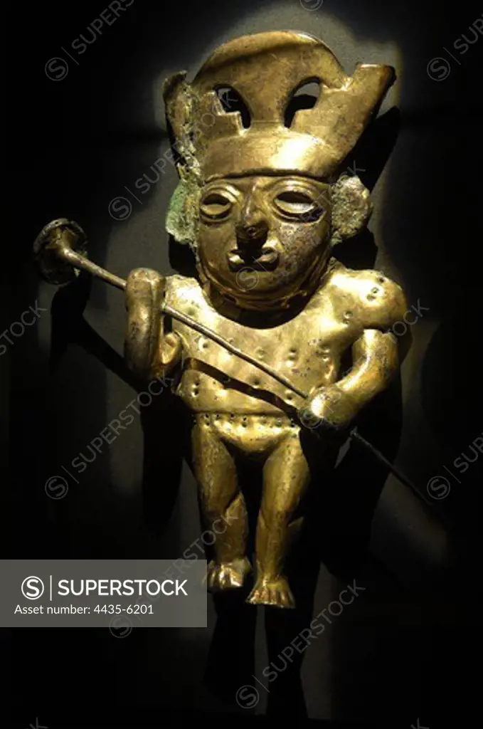 Image in golden copper depicting a lord with a combat weapon (3rd c. AD). Moche or Mochica Art. PERU. LAMBAYEQUE. Sipn. Royal Tombs of Sipn Museum.