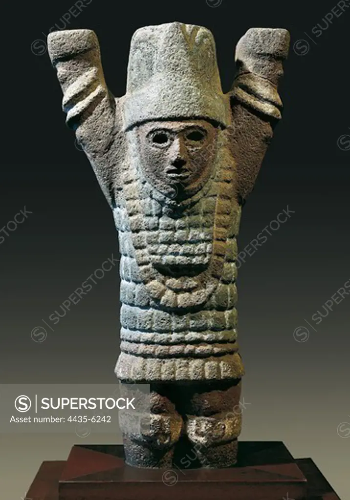 Atlantis or warrior with arms raised. Polychrome stone sculpture. Toltec art. Sculpture. MEXICO. FEDERAL DISTRICT. Mexico City. National Museum of Anthropology. Proc: MEXICO. MORELOS. Xochicalco.