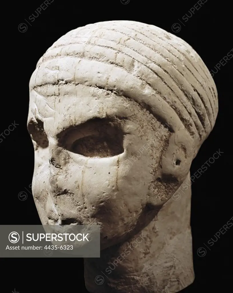 Head from Khirbet el Hajjar (10th c. BC). Iron Age. Sculpture on rock. JORDAN. Amman. Archaeological Museum.