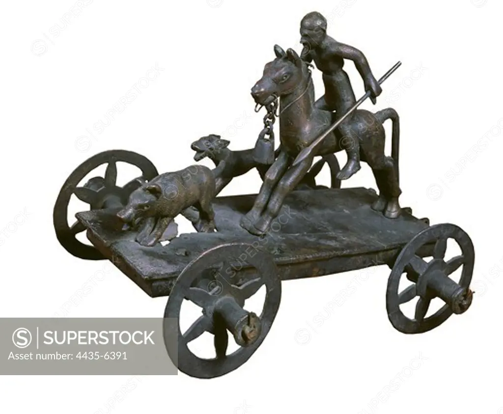 Wild boar Hunting Chariot. 5th-3rd c. BC. Iberian art. Sculpture on bronze. FRANCE. ëLE-DE-FRANCE. YVELINES. Saint-Germain-en-Laye. Museum of National Antiquities. Proc: SPAIN. EXTREMADURA. BADAJOZ. MŽrida.