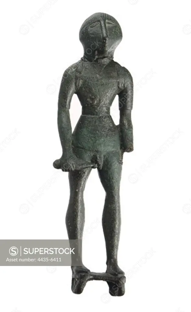 Iberian ex-voto: Warrior. 3rd BC. Iberian art. Sculpture on bronze. SPAIN. MADRID (AUTONOMOUS COMMUNITY). Madrid. National Museum of Archaeology. Proc: SPAIN. ANDALUSIA. JAEN. Santa Elena. Sanctuary of Collado de los Jardines.