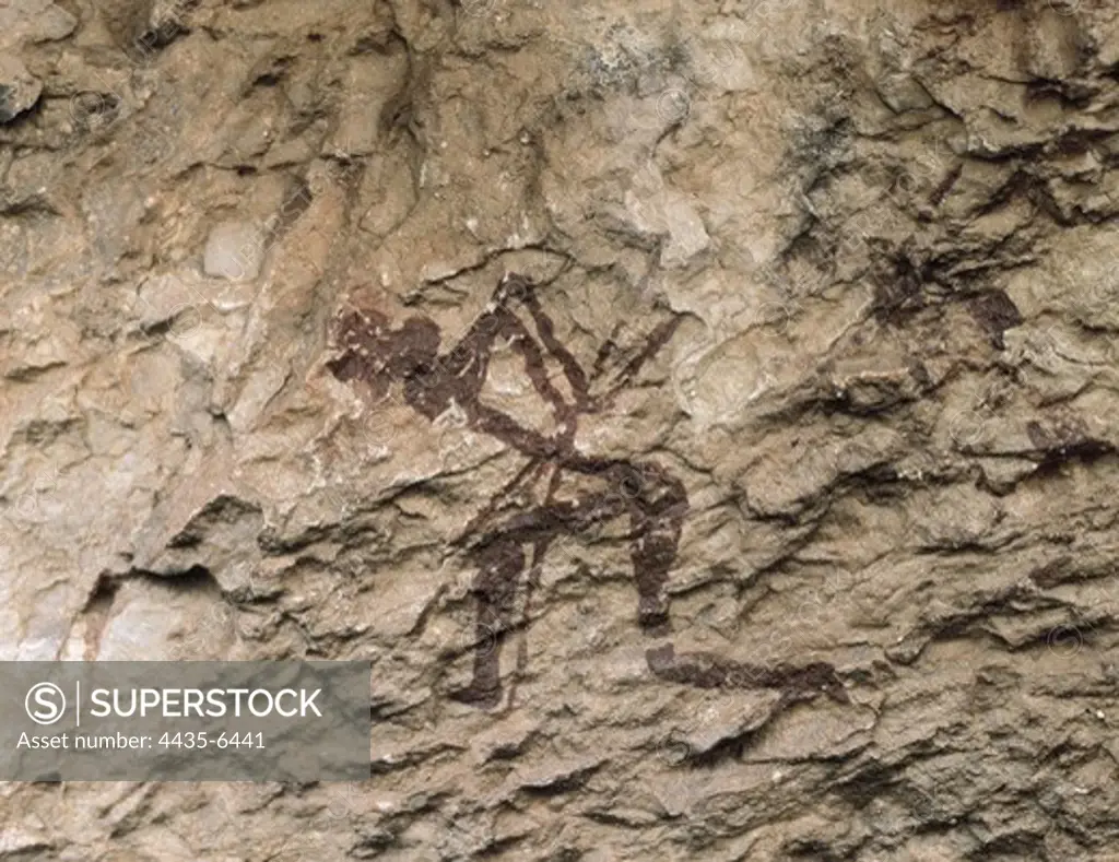 SPAIN. Vinromˆ. La Saltadora Cave. Hunter. Rupestrian paintings of La Valltorta. Neolithic art. Cave.