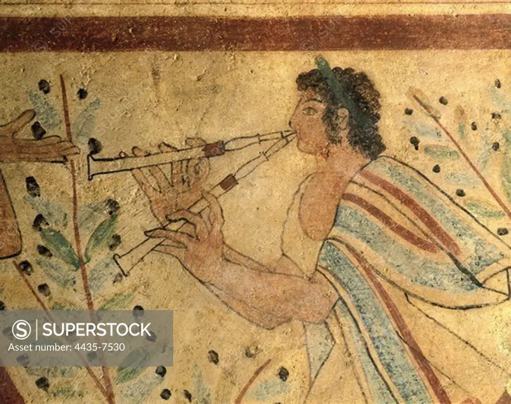 Tomb of the Leopards. ITALY. Tarquinia. Necropolis of Monterozzi. Tomb of the Leopards. Flute player. Etruscan art. Fresco.