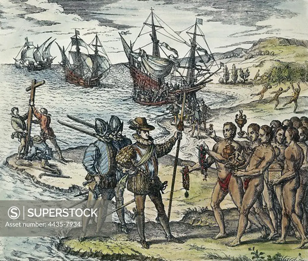 BRY, Theodor de (1528-1598). Columbus Landing in the Indies. 1594. Columbus meets Indians in the Guanahani Island (now San Salvador) or Hispaniola. Columbus receiving gifts from the cacique, Guacanagari. Xylography.