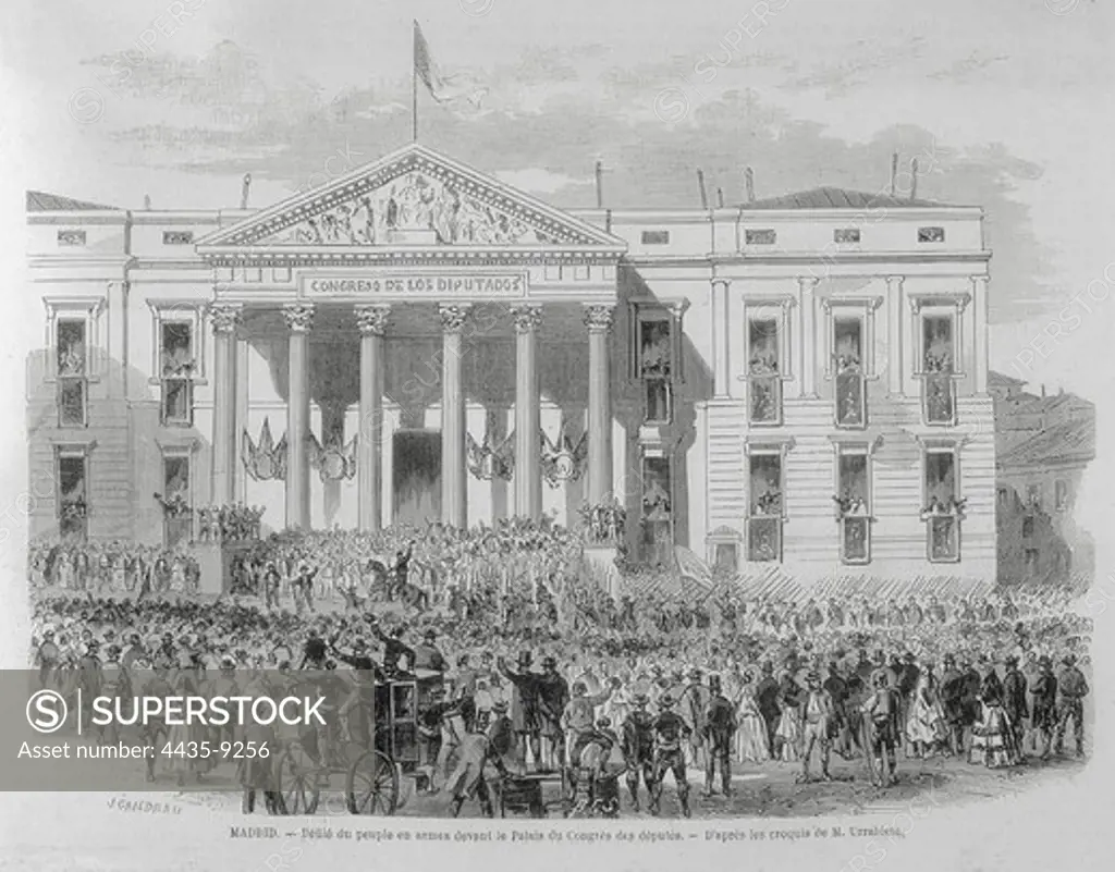 Spain (1868). Madrid. Armed people parading in front of the Congress. Illustration after a drawing by M. Urrabieta published in 'L'Illustration. Journal Universel'. Etching.