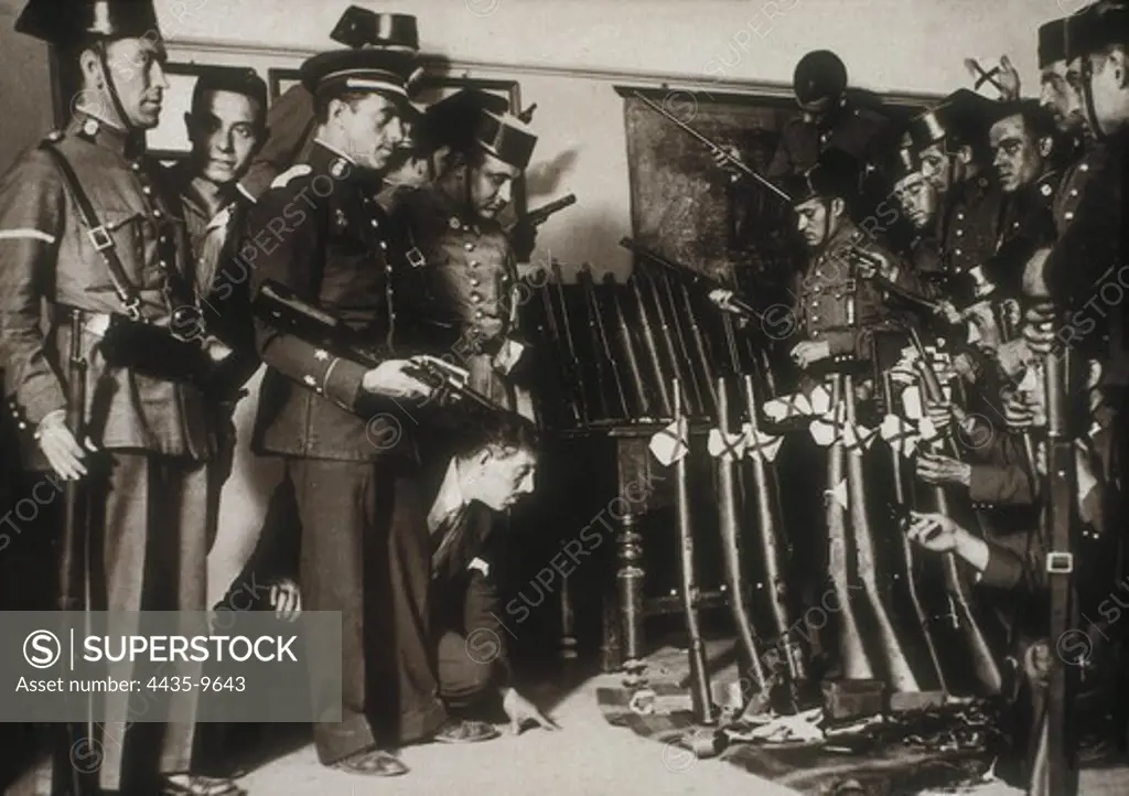 Spain. Second Republic (1931-1936). The Civil Guard discovering an arsenal of a revolutionary group.