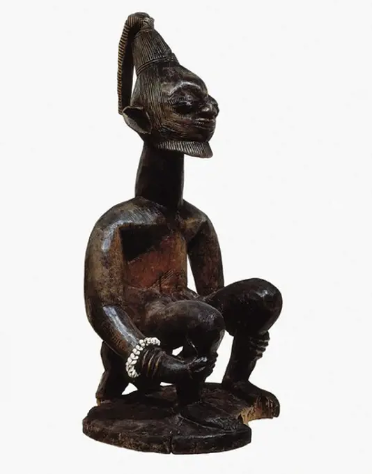Figure sitting on a loch. Yoruba art. Sculpture on wood. FRANCE. ëLE-DE-FRANCE. Paris. Museum of African and Oceanic Arts. Proc: NIGERIA.