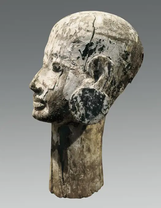 Head of woman. 1550 -1196 BC. Profile. Work from the 18th or 19th Dynasty. Egyptian art. New Kingdom. Sculpture on wood. EGYPT. CAIRO. Cairo. Egyptian Museum. Proc: EGYPT. CAIRO. Saqqara.