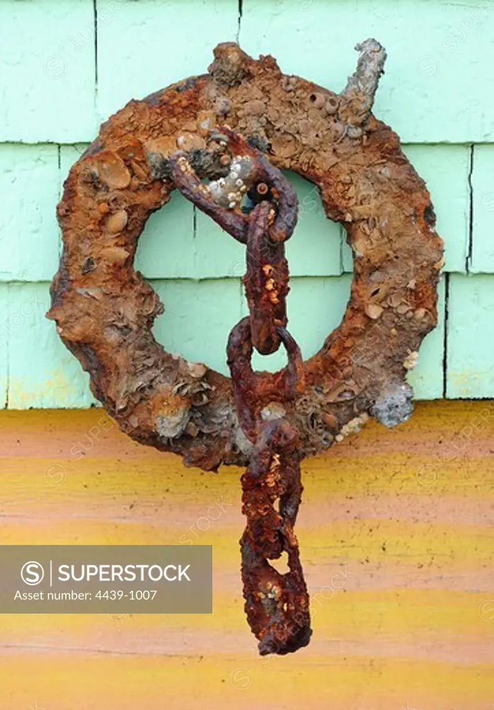 USA, Massachusetts, Glouscester, Rust covering life saver and chain