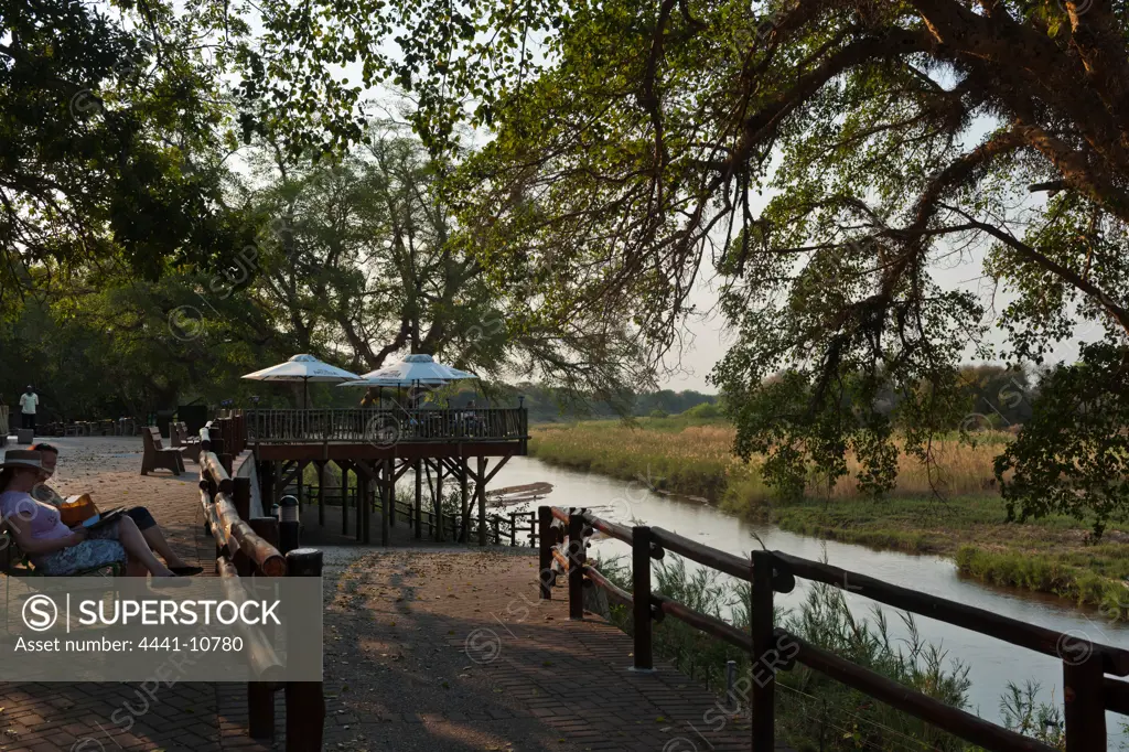 View of the deck and Sabi River at Skukuza Camp. Kruger National Park. Mpumalanga. South Africa. Skukuza is the main camp in the Kruger National Park.