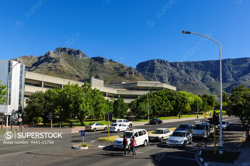 Tenant Street scene and Cape Town Campus of the Cape Peninsula University of Technology with Table Mountain in the background. Cape Town. Western Cape. South Africa