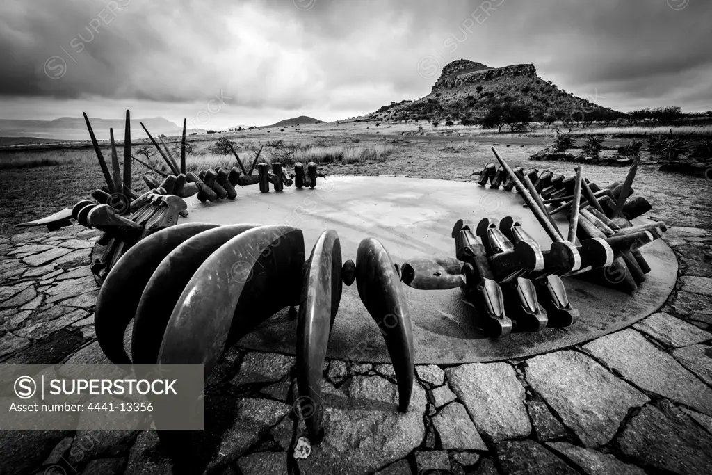 The Monument to the fallen Zulu Warriors at Isandlwana Battlefield. KwaZulu Natal Midlands. South Africa. A large bronze iziqu (bravery) necklace, symbolising courage and loyalty to the Zulu kings.