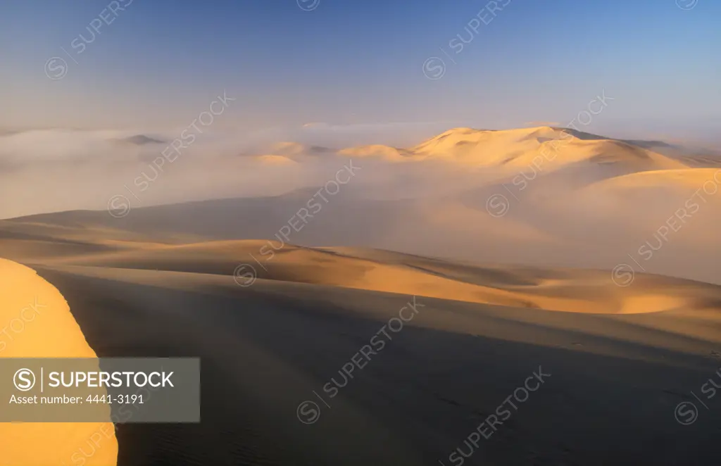 Sea Fog and Sand Dunes. Swakopmund, Namibia.