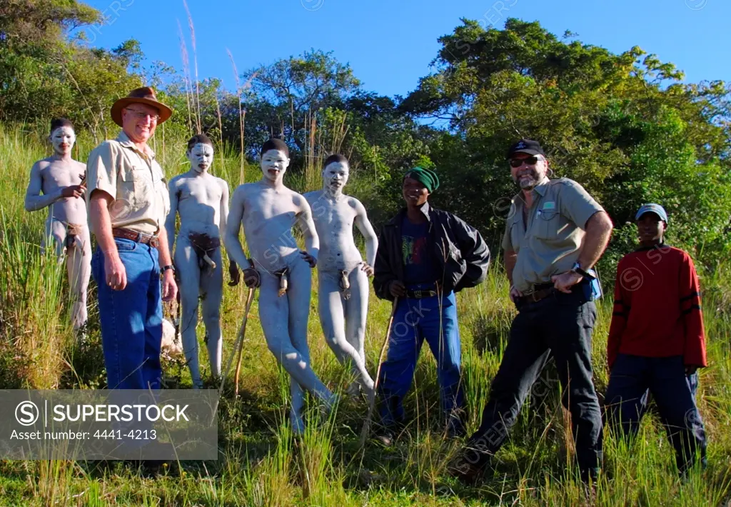 Roger McGlaughlin (L) and Roger de la Harpe (R) with amakweta (young Xhosa men that have recently been circumcised). Wild Coast. Eastern Cape. South Africa