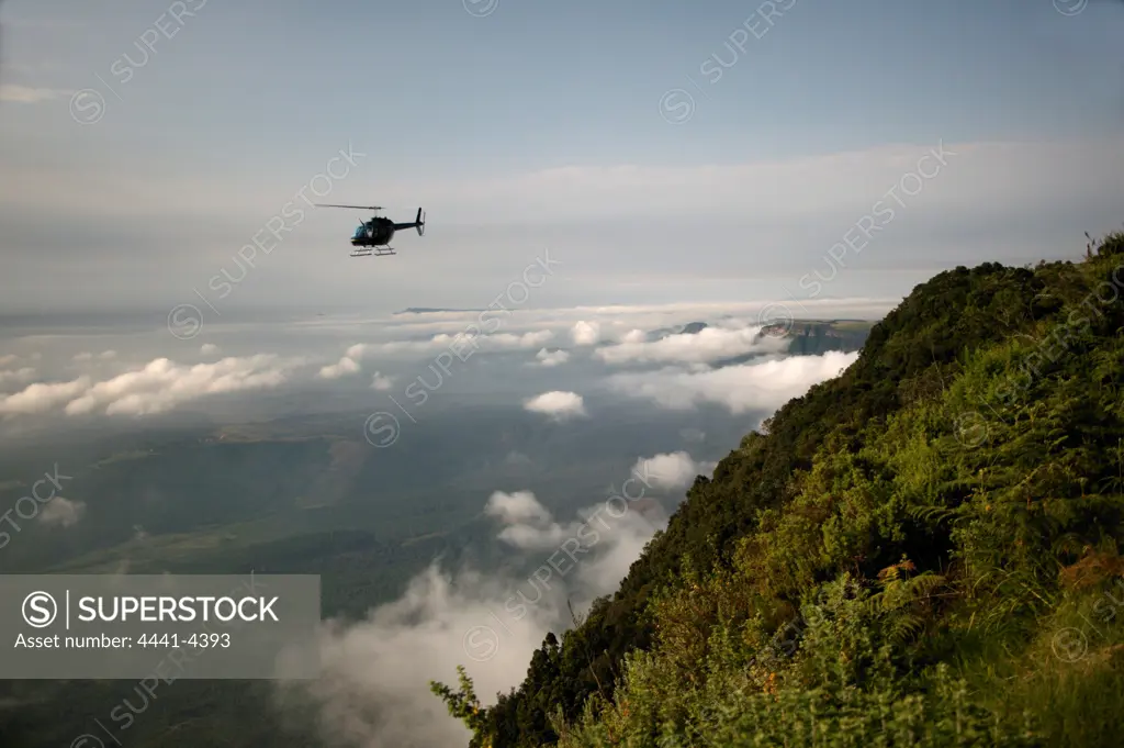 Aerial view of Drakensberg Mountains and Mpumalanga Escarpment at Wonder View while on helicopter safari by Mountain Magic Helicopters. Graskop. Mpumalanga. South Africa