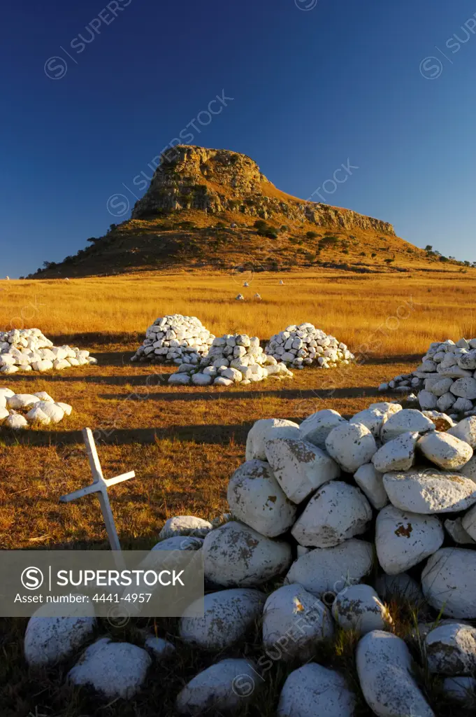 Cairns of white stones and memorials mark the places where British soldiers died at the Battle of Isandlwana during the Anglo Zulu War of 1879. Near Nqutu. kwaZulu-Natal. South Africa