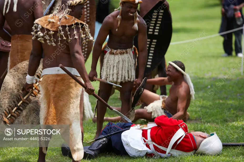 Reenactment of British soldiers and Zulu warriors fighting. Dundee. KwaZulu Natal. South Africa