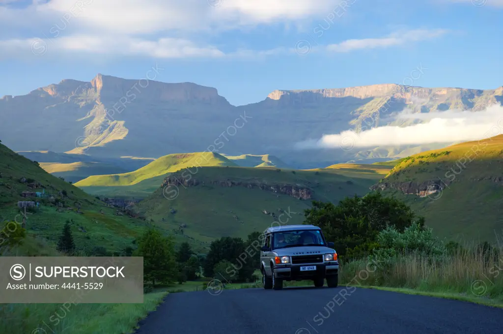 Road access to  Giants Castle Camp and view of Giants Castle. Ukhahlamba Drakensberg Park. KwaZulu Natal. South Africa