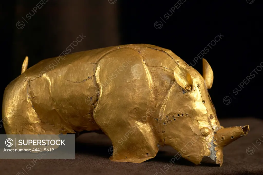 Gold rhino. Artifact recovered from Mapungubwe Hill. Northern Province. South Africa. Made from multiple pieces of fine gold foil Mapungubwe Museum. University of Pretoria