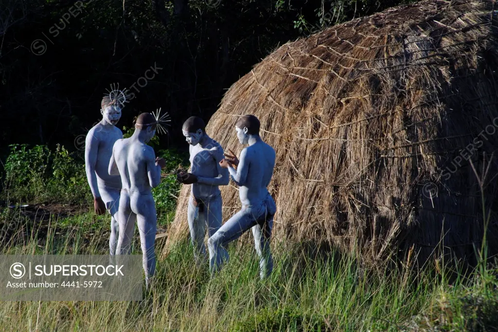 Xhosa amaKwetha (young men who have just been circumcised as part of their initiation into manhood) outside their hut. Coffee Bay. Wild Coast.  Eastern Cape. South Africa